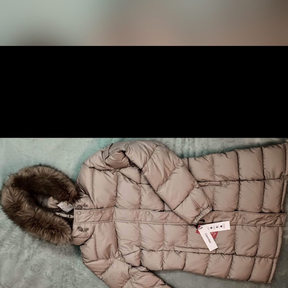 Women's tan Calvin Klein long winter jacket with hood. Size M